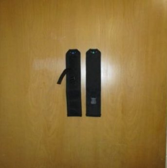 two black chest straps